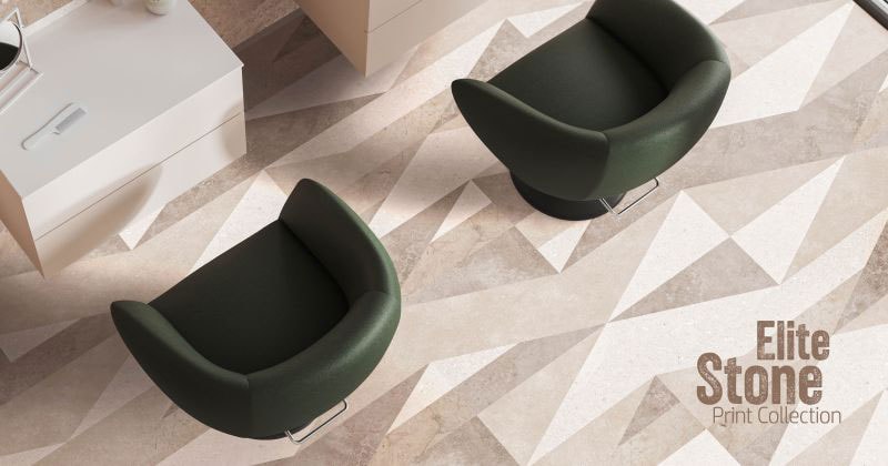 Top view of a modern interior with two dark green armchairs placed on a geometric stone-look patterned floor. The text “Elite Stone Print Collection” appears in the lower right corner. The image presents a decorative design floor for high-quality interiors.